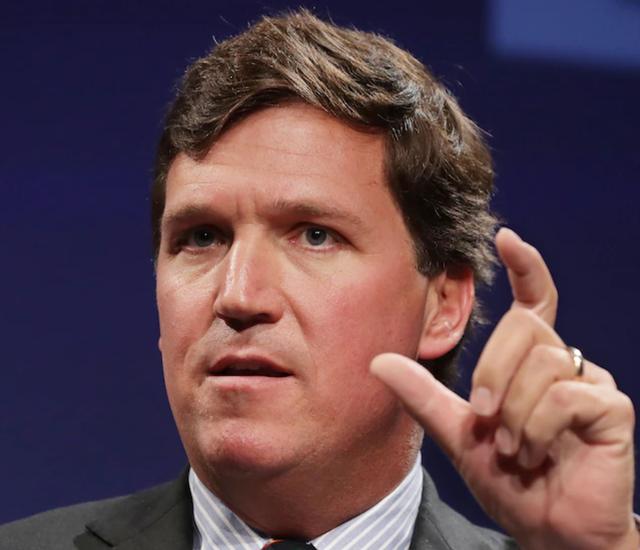 The hairline of Tucker Carlson